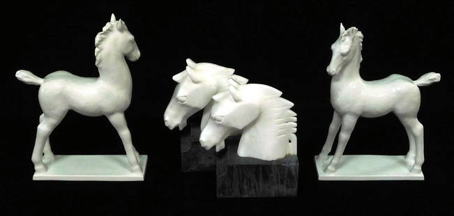 Horse themed figures and bookends, four pieces: Michael: Horse themed figures and bookends, four pieces: Michael Powolny for Augarten Vienna Porcelain Manufactory, c. 1945, pair of blanc de chine foals on flat rectangular base, underglaze blue manufacture