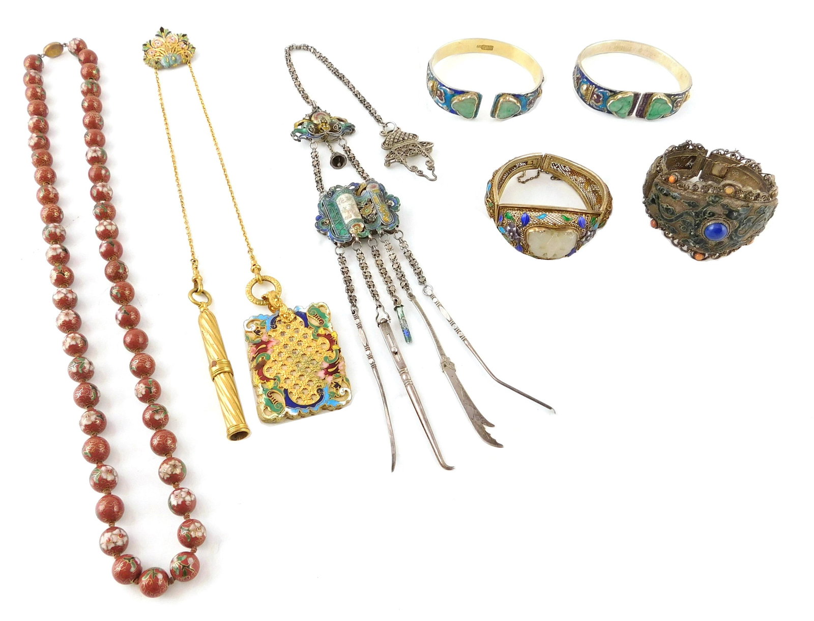 ASIAN: Seven enamel decorated pieces of jewelry,: ASIAN: Seven enamel decorated pieces of jewelry, including four cuff bracelets, two with elaborate filigree design and hardstone additions and marked silver; two chatelaines, one gold-tone with notepa