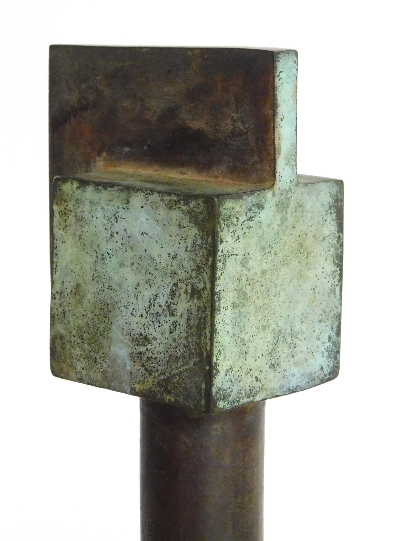 Modern metal sculpture, curved rod with small block at (1 of 3)