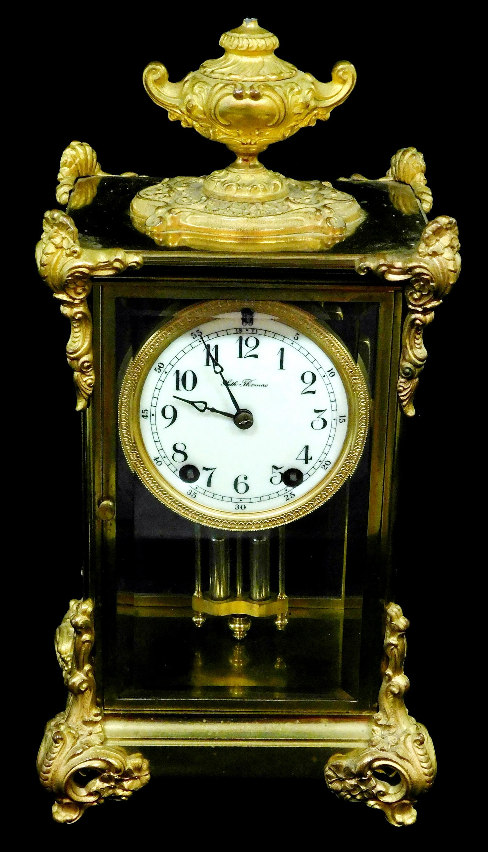 CLOCK: Seth Thomas Clock Co., Thomaston, Conn., "Empire: CLOCK: Seth Thomas Clock Co., Thomaston, Conn., "Empire No. 16" crystal regulator mantel clock, c. 1909, brass case with scrollwork and gilded accents, steel hands, white enamel dial with Arabic numer