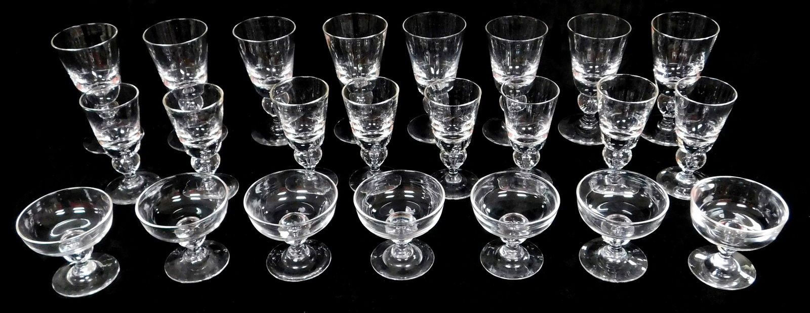 GLASS: Steuben stemware, twenty-three pieces, matching: GLASS: Steuben stemware, twenty-three pieces, matching set with teardrops, pieces include: eight water, 6 3/4" h.; eight wine, 5 3/4" h.; seven sherbets, 3 3/4" h., all pieces signed on base, all with
