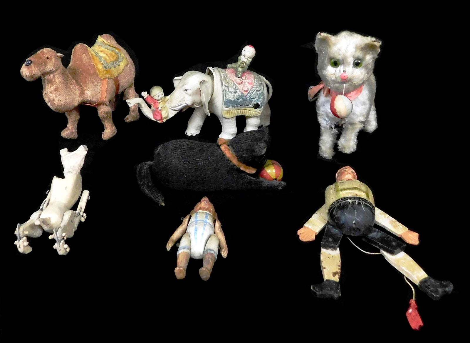 TOYS: Seven early 20th C. windup and pull string toys, (1 of 8)