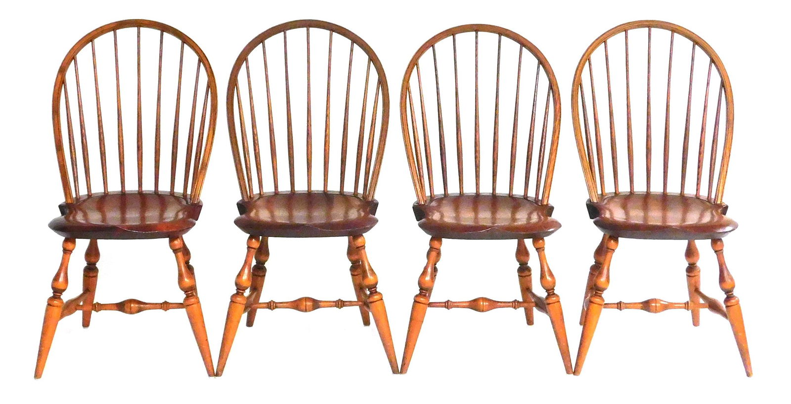 Four Windsor side chairs by Warren Chair Works, 20th C., natural finish, continuous crest rail, (1 of 3)