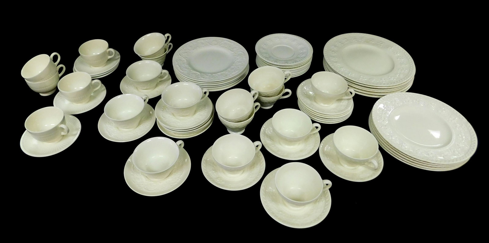 CHINA: Wedgwood, seventy pieces, three patterns, off-white, including "Wellesley" nine teacups, ten: CHINA: Wedgwood, seventy pieces, three patterns, off-white, including "Wellesley" nine teacups, ten saucers, 5 7/8" diam.; six dinner plates; 10 7/8" diam.; six lunch plates, 9 1/2" diam.; nine bread 