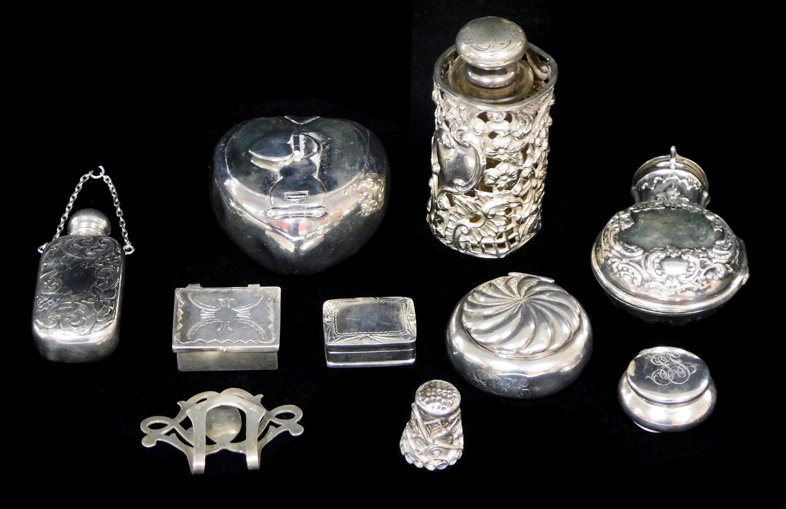 SILVER: Eleven small accessories, most marked sterling, one tested silver, details include: tall (1 of 3)
