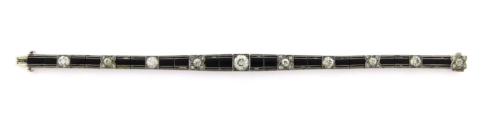 JEWELRY: Platinum Art Deco diamond and onyx bracelet, hinged bracelet tested platinum with 18K white (1 of 5)
