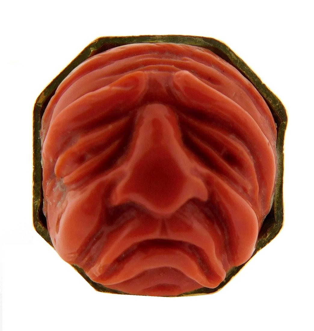 JEWELRY: Stamped 18KY coral ring, consisting of an octagonal ring design with bark finish, measuring (1 of 4)