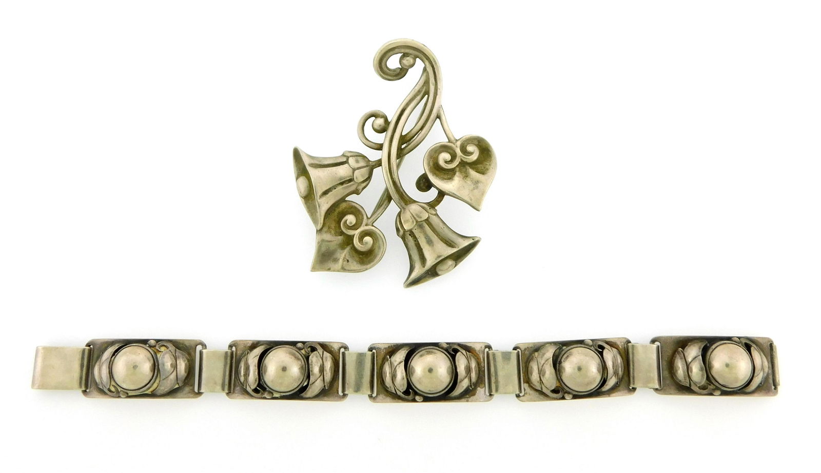 JEWELRY: Georg Jensen bracelet and Tiffany & Co. pin, both marked sterling silver, details include: (1 of 5)