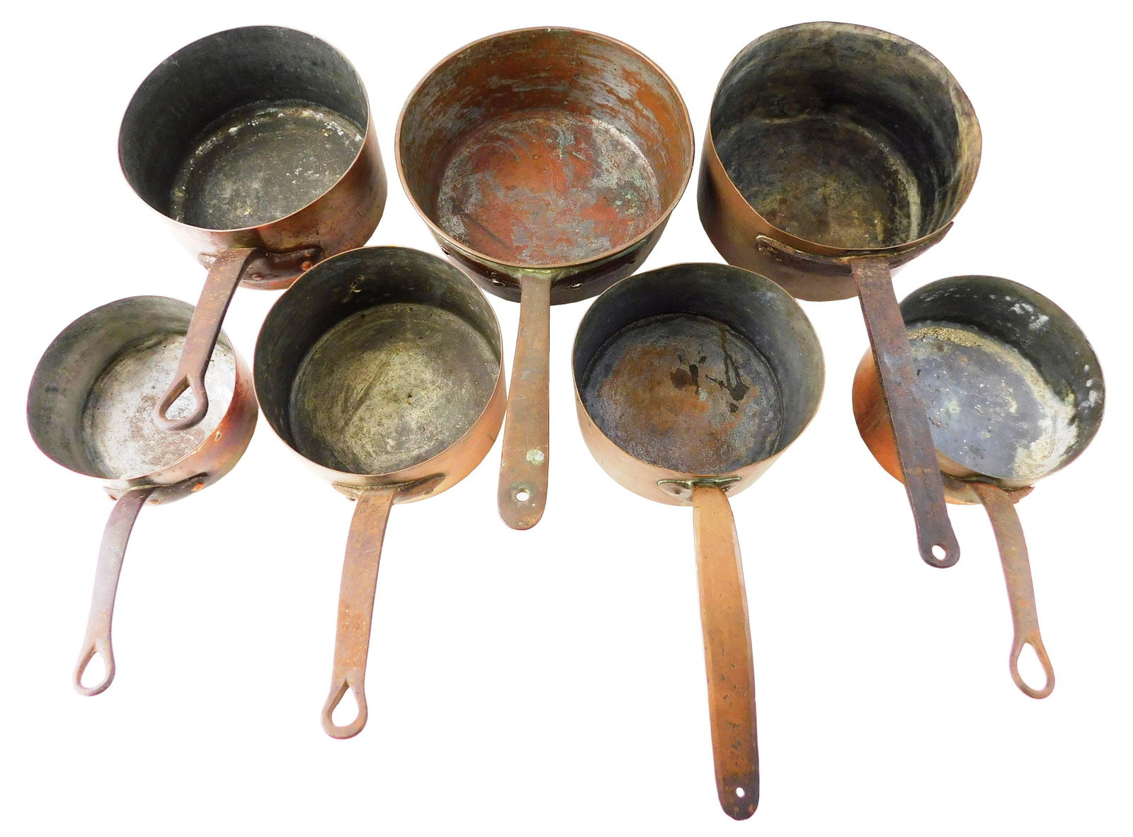 Seven copper cooking pots, set of four graduated 6" to 9" diam.; along with a set of three graduated (1 of 2)