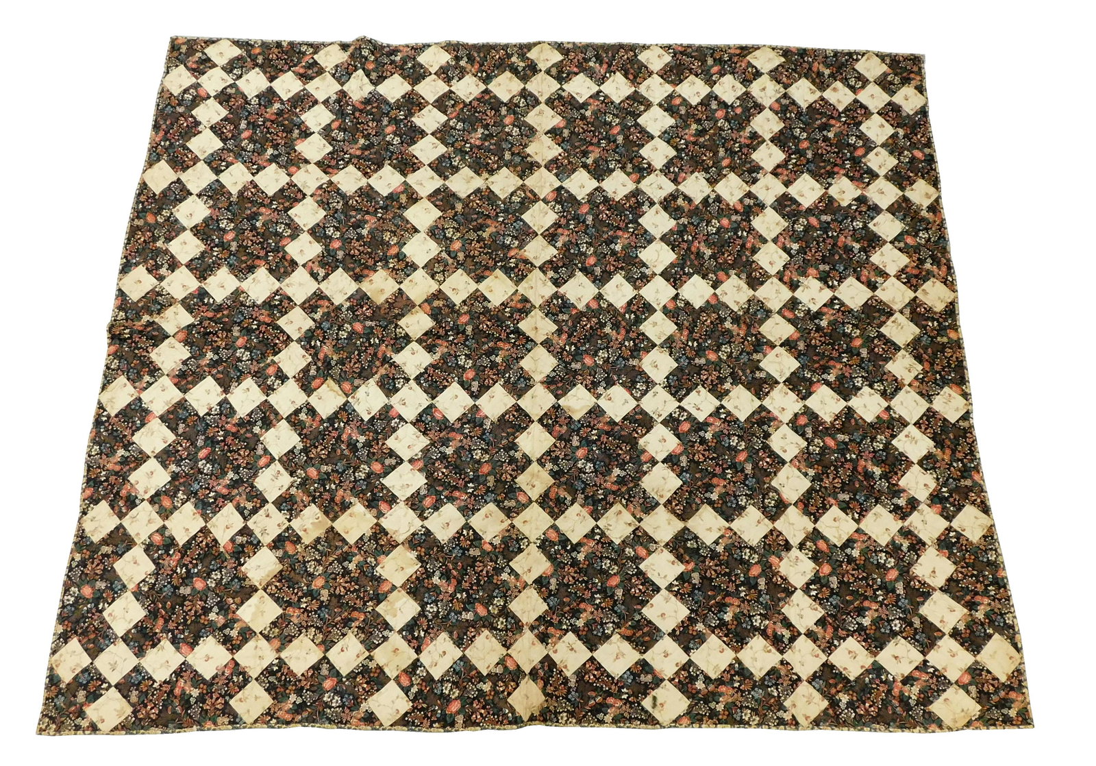 TEXTILE: Pieced calico quilt with a design of a Nine Patch block alternating with a plain calico (1 of 4)