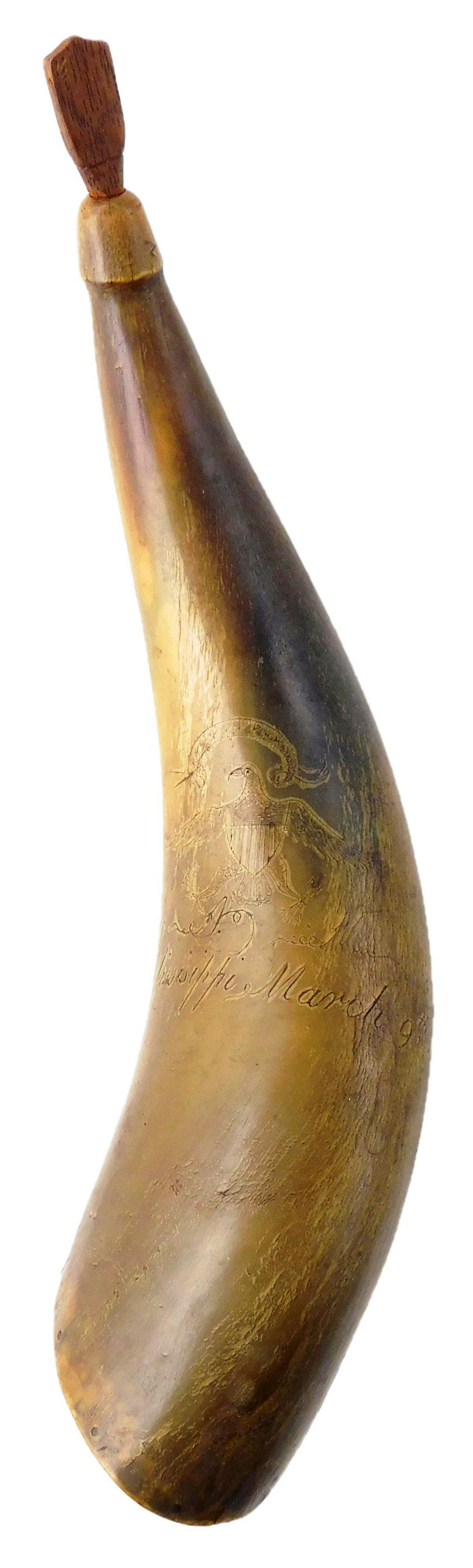 Scrimshaw powder horn, American, 1810, cow horn inscribed with American eagle over monogram "G. A.: Scrimshaw powder horn, American, 1810, cow horn inscribed with American eagle over monogram "G. A. M" over inscription "Mississippi, March 9th 1810", carved wooden plug and cover, wear consistent with