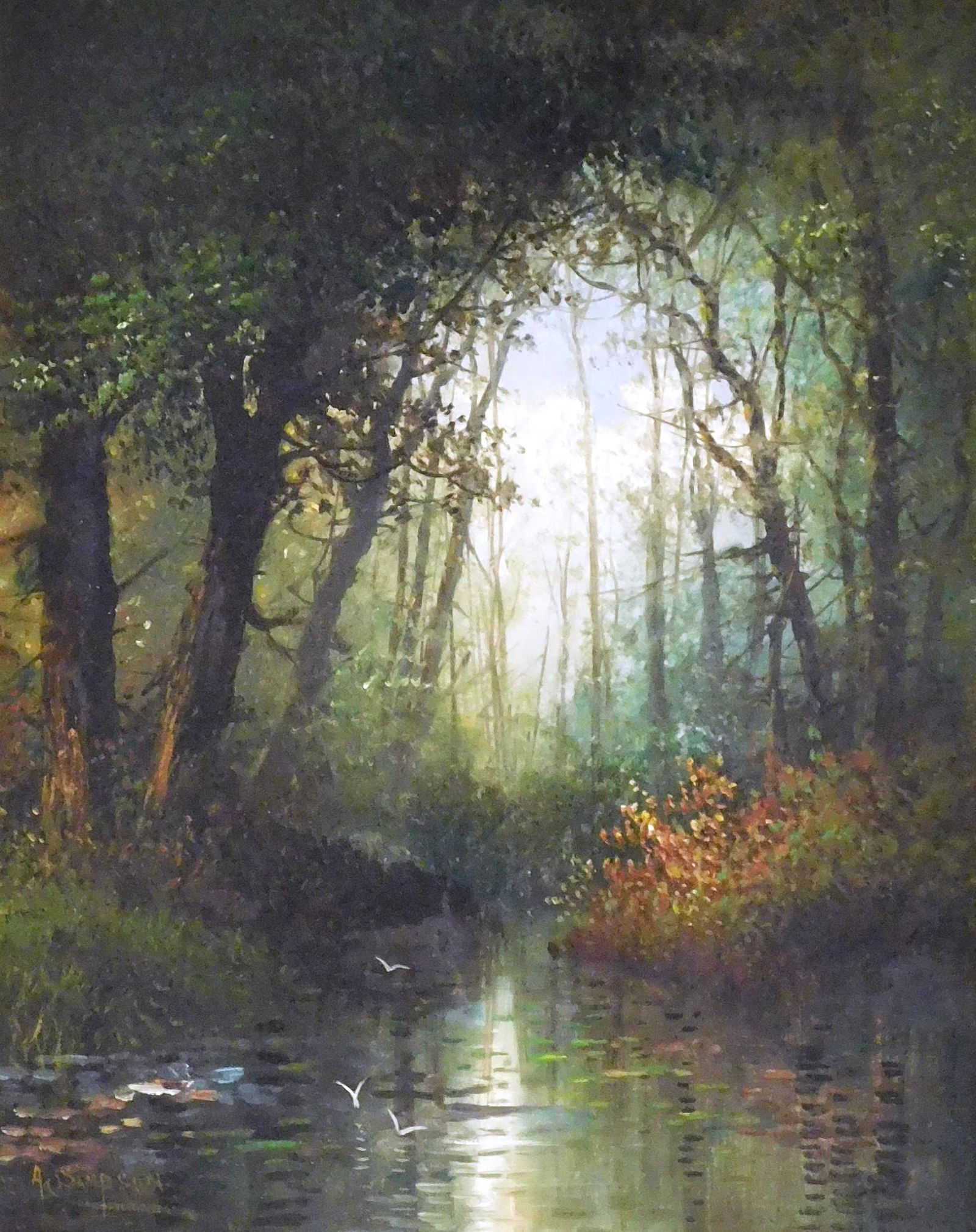 Alden Sampson (American, 1853 - ?) oil on canvas laid down on masonite, darkly wooded landscape with: Alden Sampson (American, 1853 - ?) oil on canvas laid down on masonite, darkly wooded landscape with light filtering through trees at center, blue sky beyond, the light reflects off a creek with birds