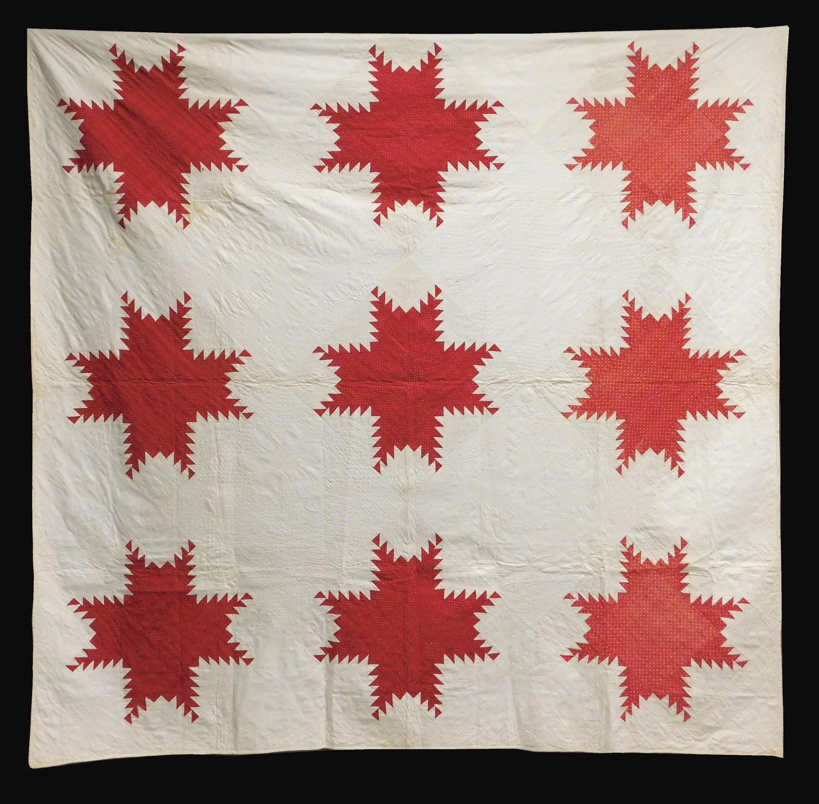 TEXTILE: Pieced quilt with nine large feathered stars in red calico on white background, 1848, the (1 of 3)