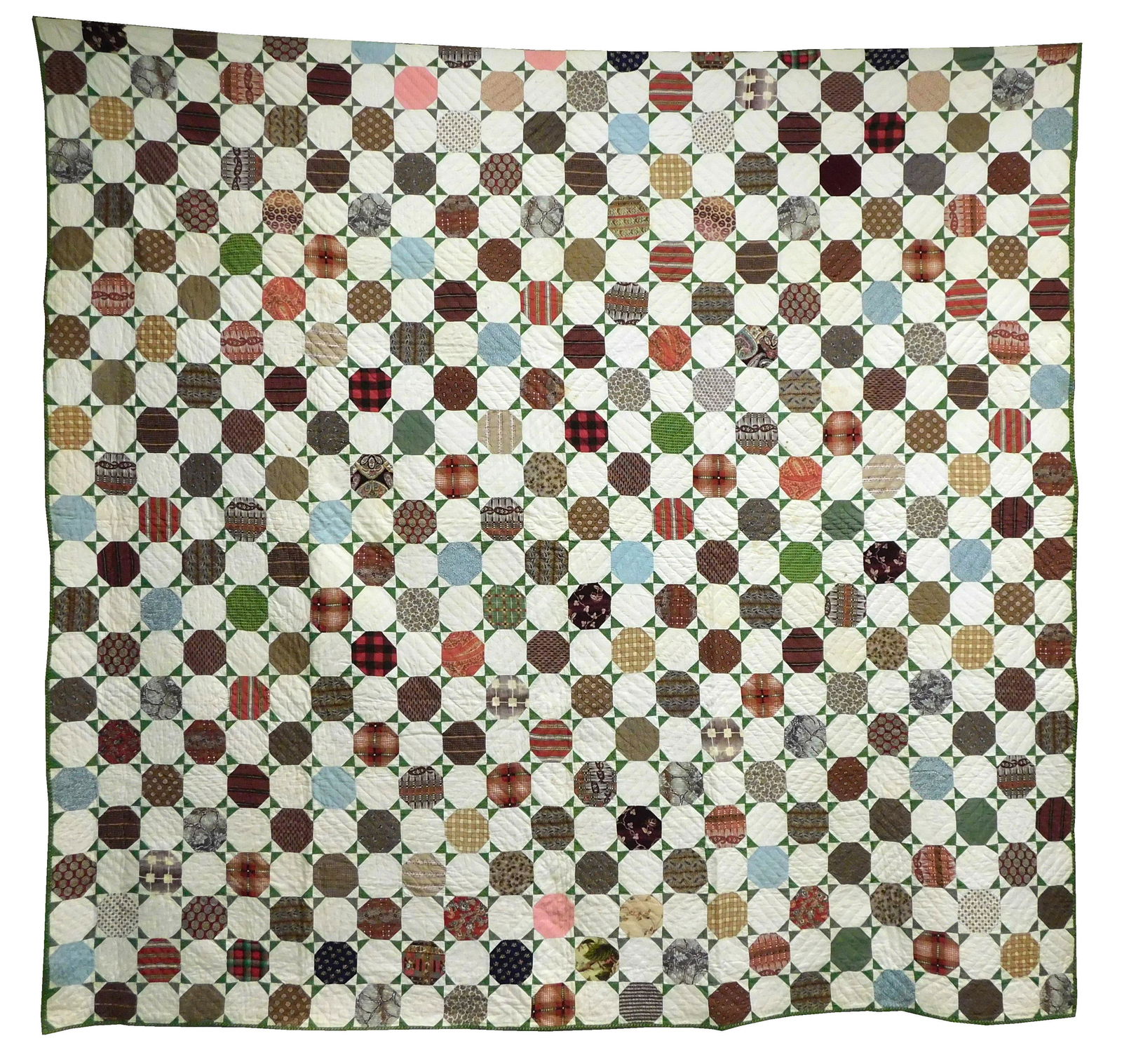 TEXTILE: Pieced quilt, c. 1850, primarily cotton calicoes, but also including a number of wool (1 of 2)