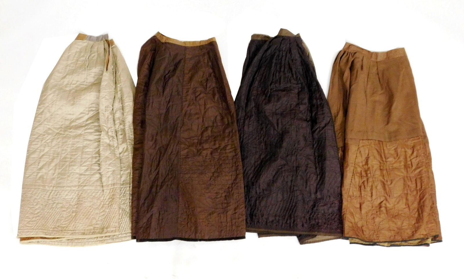 TEXTILE: Four 19th C. quilted petticoats, silk with cotton, fair to good condition: one beige with (1 of 6)