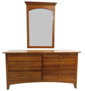 Ethan Allen "New Impressions" long dresser and wall mirror, American, 20th/ 21st C., cherry, Arts &: Ethan Allen "New Impressions" long dresser and wall mirror, American, 20th/ 21st C., cherry, Arts & Crafts style, details include: dresser with two sets of three graduated long drawers, on tapered