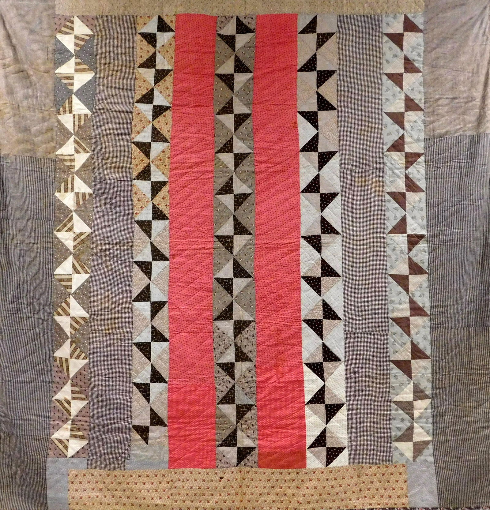 TEXTILE: Pieced cotton patchwork quilt, c. 1880, hourglass within stripes, brown, red, beige, etc., (1 of 2)