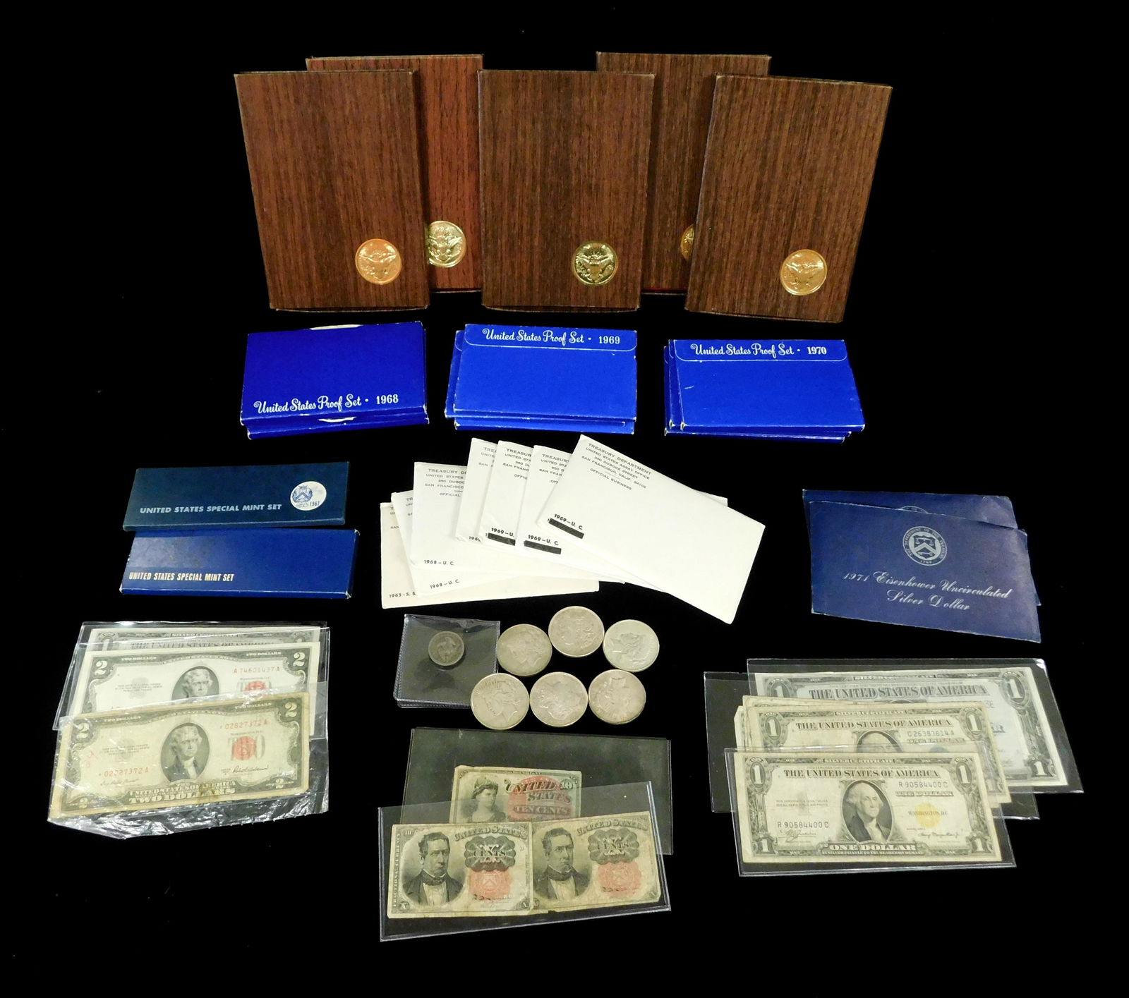 COINS: Lot of US money, paper notes, proof sets, and silver dollars: includes twelve note sets, (1 of 6)
