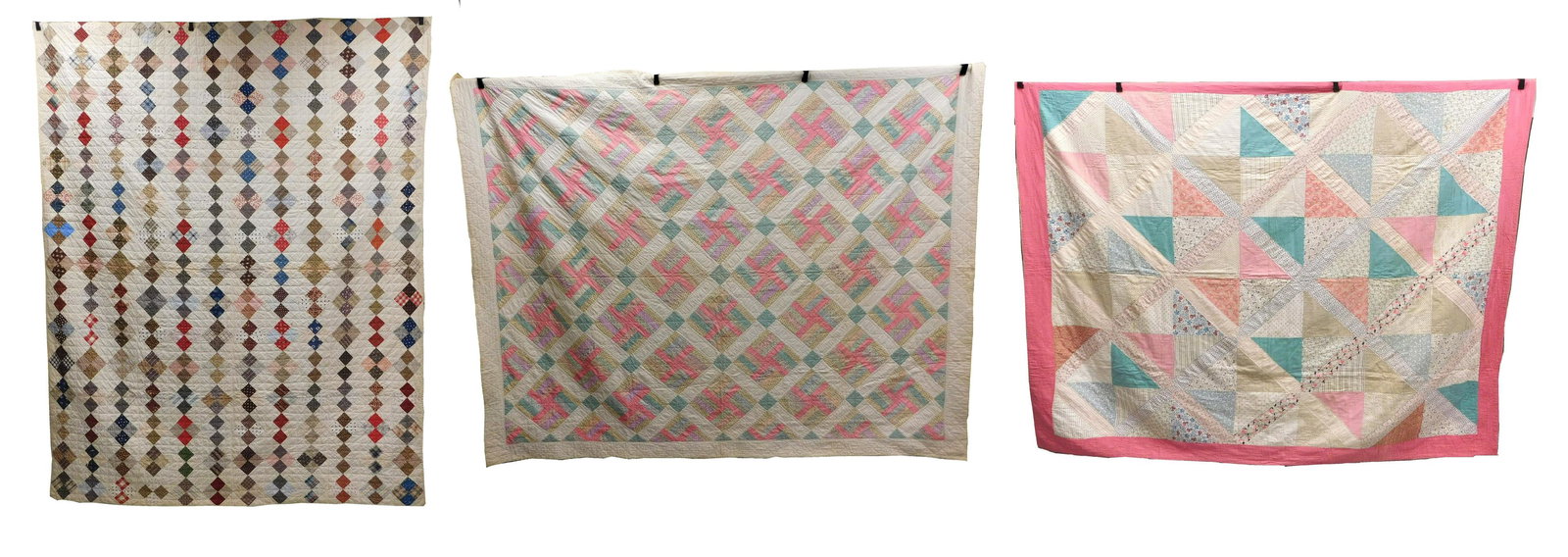 QUILTS: Three pieced cotton patchwork quilts, 19th/ 20th C., the first, 19th C with diamond stripes, (1 of 10)