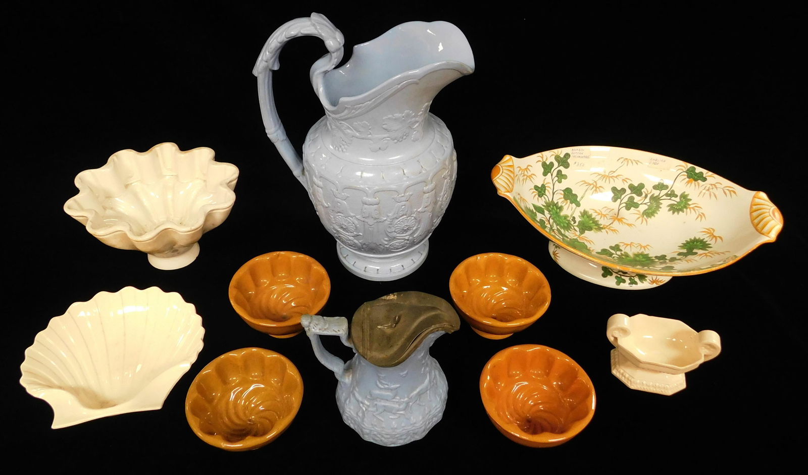 POTTERY: Ten pieces of late 19th C. creamware, yellowware and ironstone, mostly English, including: (1 of 3)