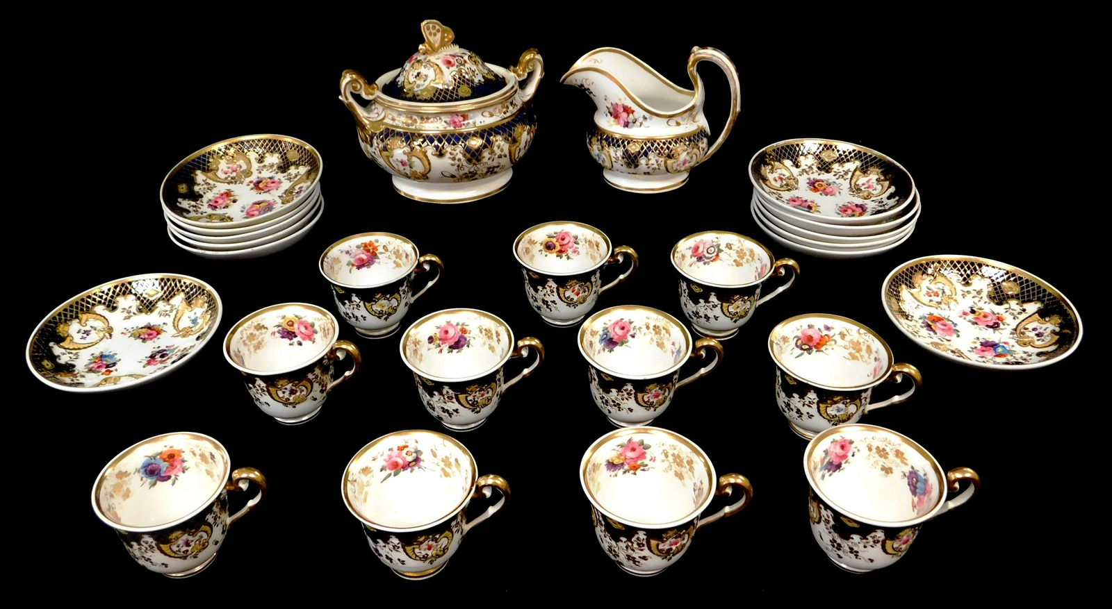 Partial porcelain tea set, English, 19th C., twenty-five pieces, molded pattern with gilt, cobalt, (1 of 6)