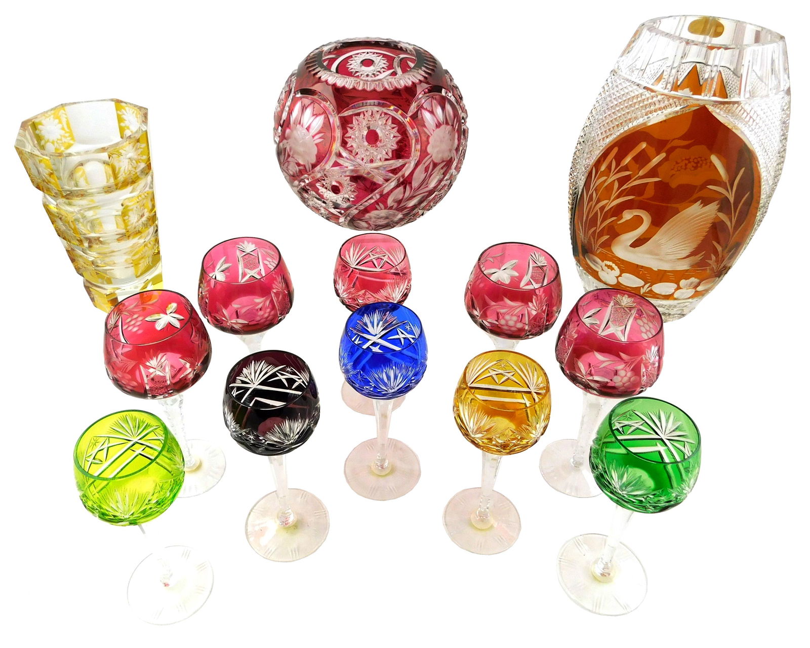 Thirteen pieces of Bohemian cut to clear flashed crystal: three vases in assorted shapes and colors; (1 of 4)