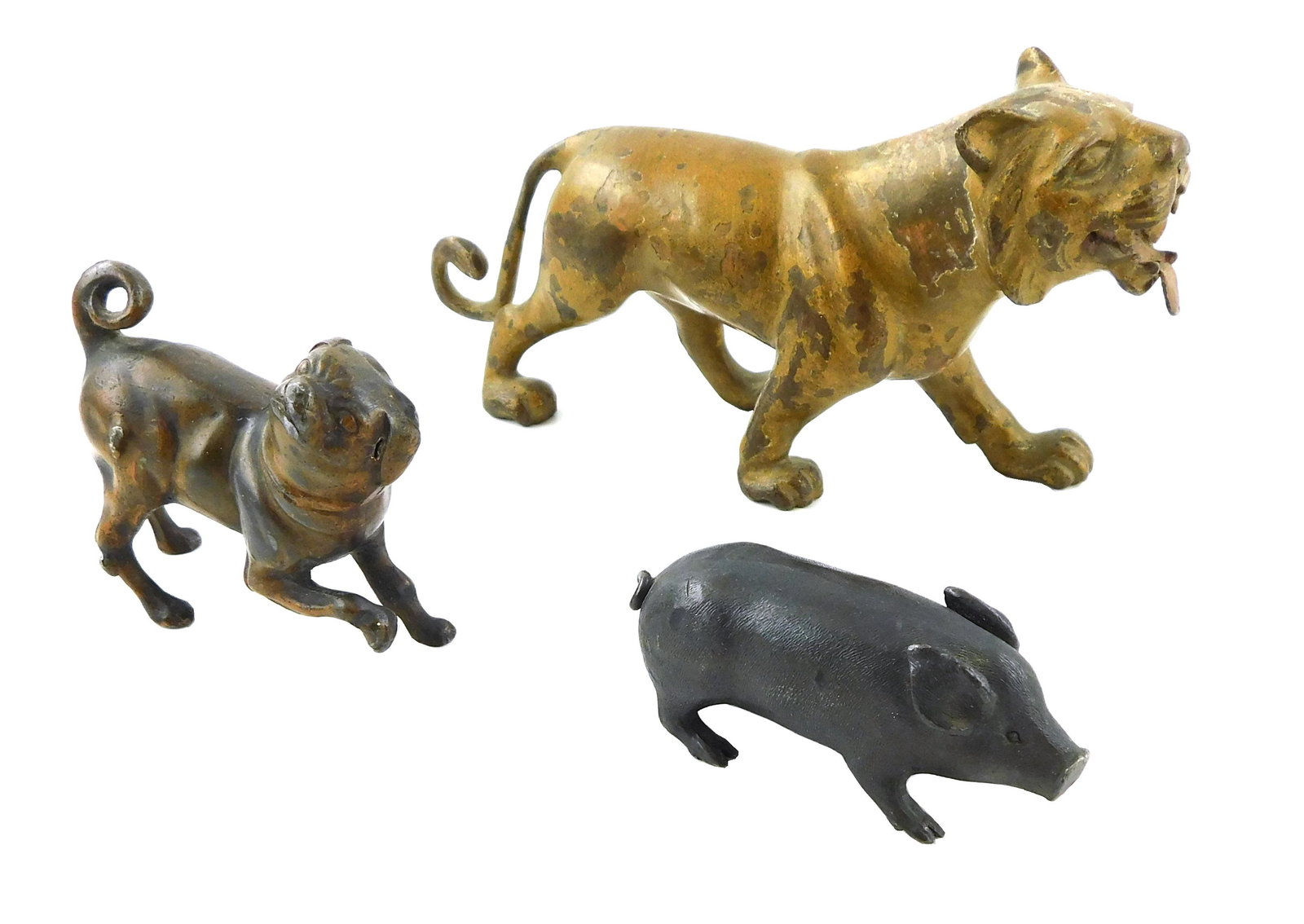 Three cast metal animals: a small pig; a pug or similar dog lifting it's front paw; and a tiger with (1 of 4)