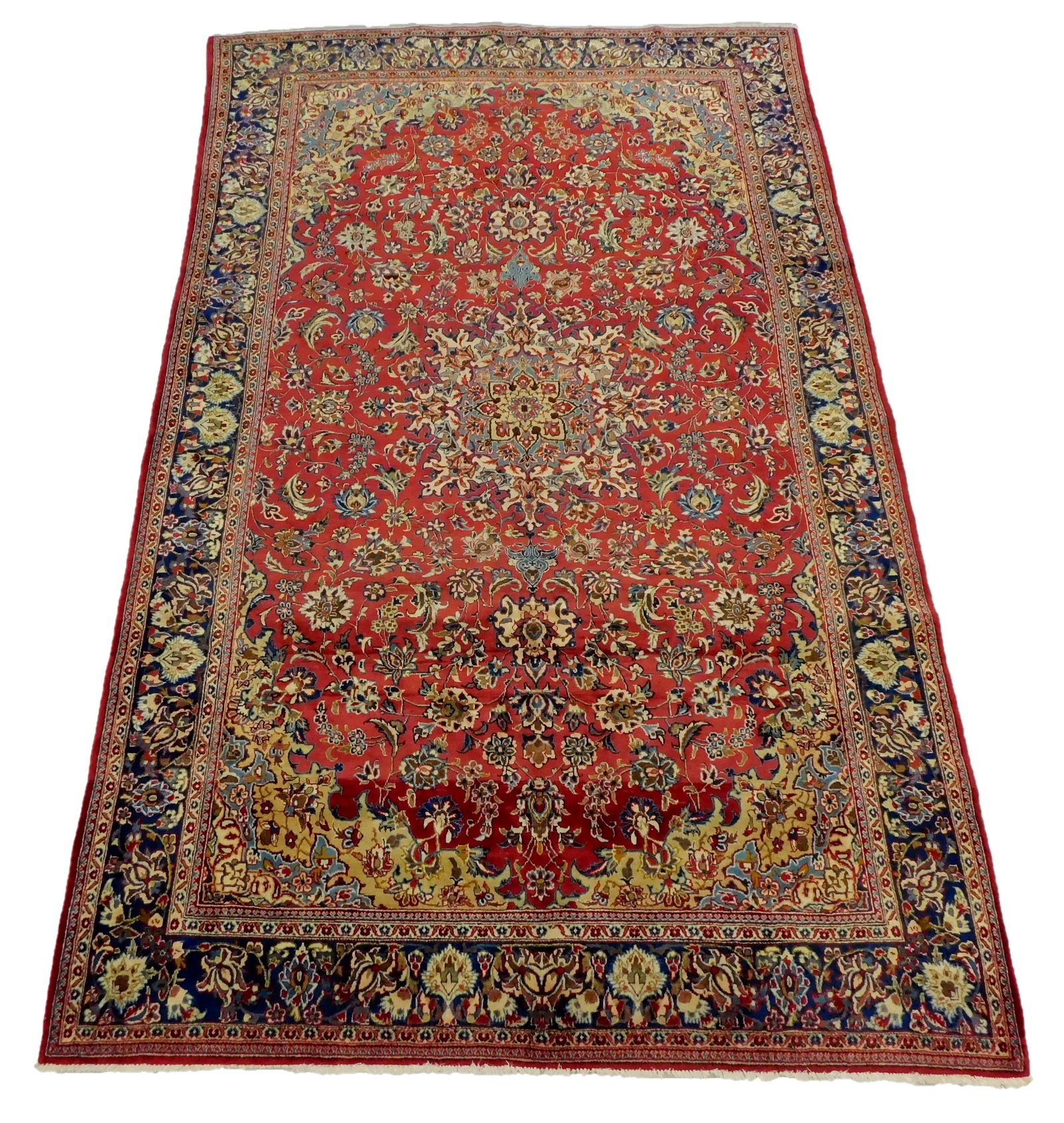 RUG: Semi Antique Persian Isfahan, 6' 9" x 11', hand woven, red field with navy border, accent (1 of 4)