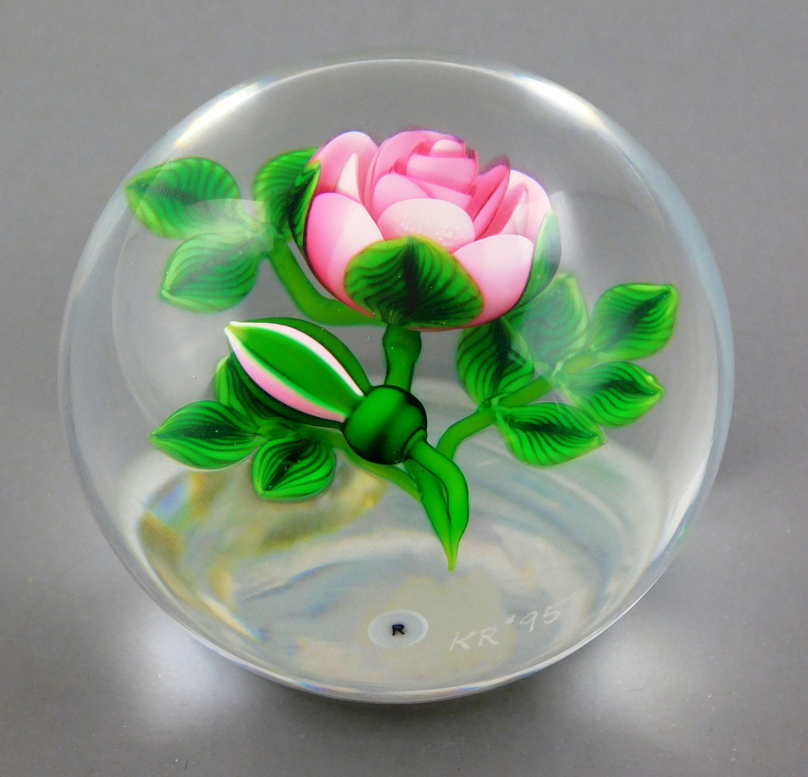 ART GLASS: Ken Rosenfeld (American, b. 1950) studio glass paperweight, pink rose opening at center (1 of 3)