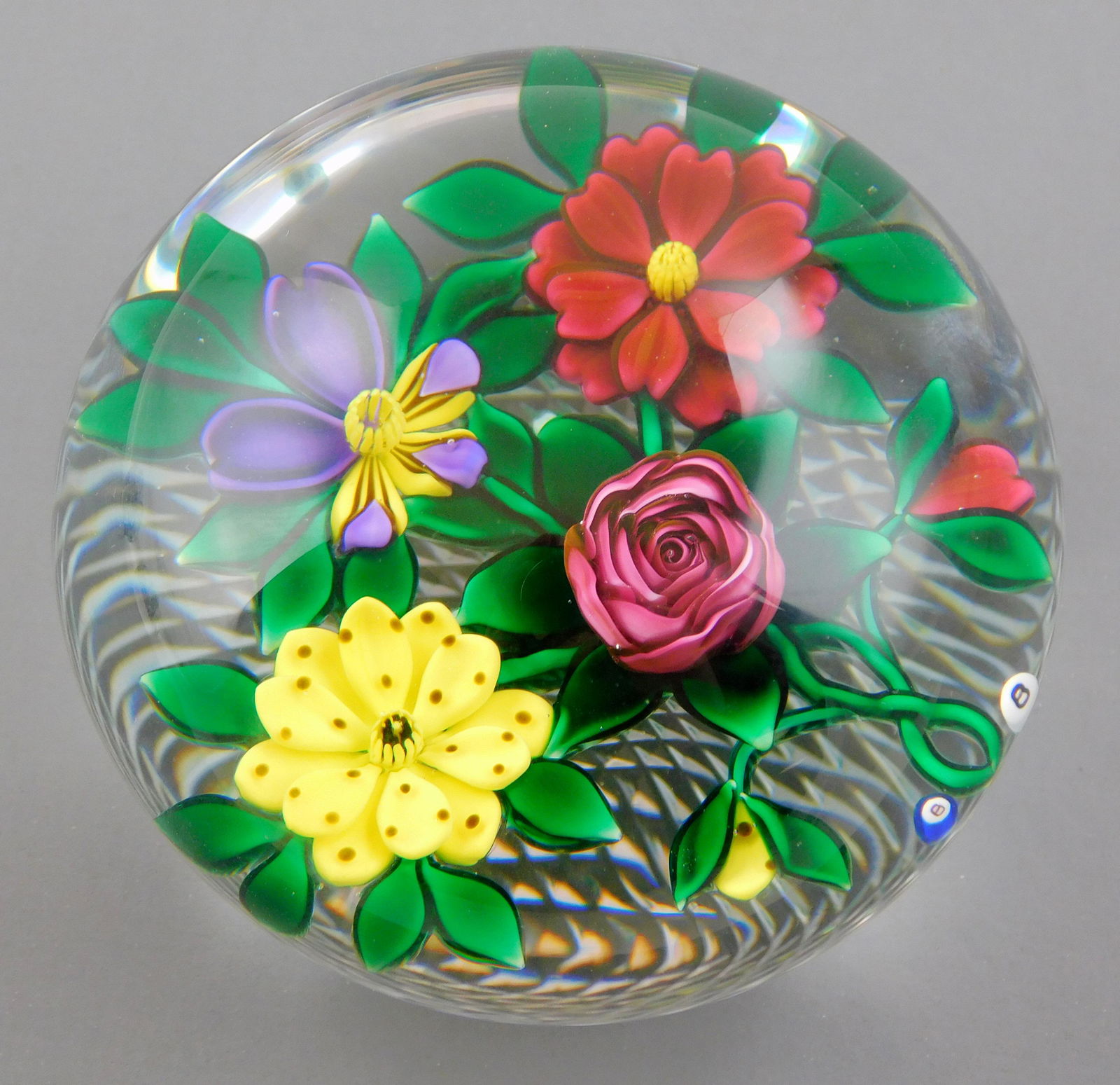 ART GLASS: Bob Banford (American, b. 1951), studio glass paperweight with four blooming flowers at (1 of 5)