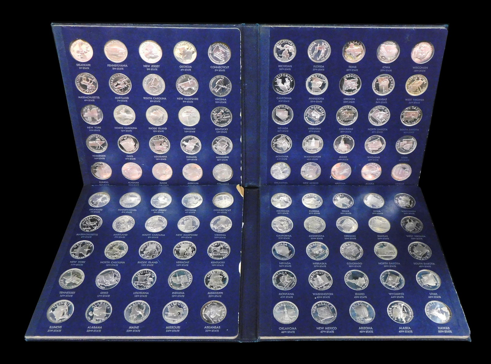 Lot of two identical Franklin Mint "States of the Union Series" of proof silver medals. Each of the: Lot of two identical Franklin Mint "States of the Union Series" of proof silver medals. Each of the two sets has 50 sterling silver medals of 32 mm diameter. [Approximate Estimated Silver Weight: 38 t