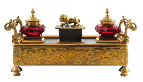 Brass desk set, late 19th/ early 20th C., inlaid wood top with two red cut glass inkwells with domed (1 of 3)