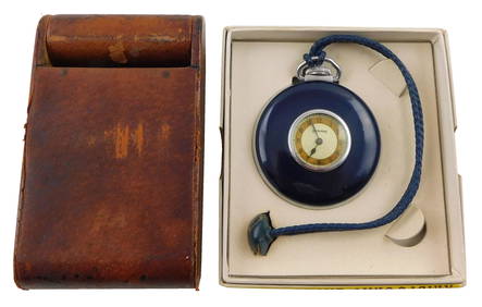 +CLOCKS: Two time pieces including: E. Gubelin traveling clock, in original leather case, clock with (1 of 6)