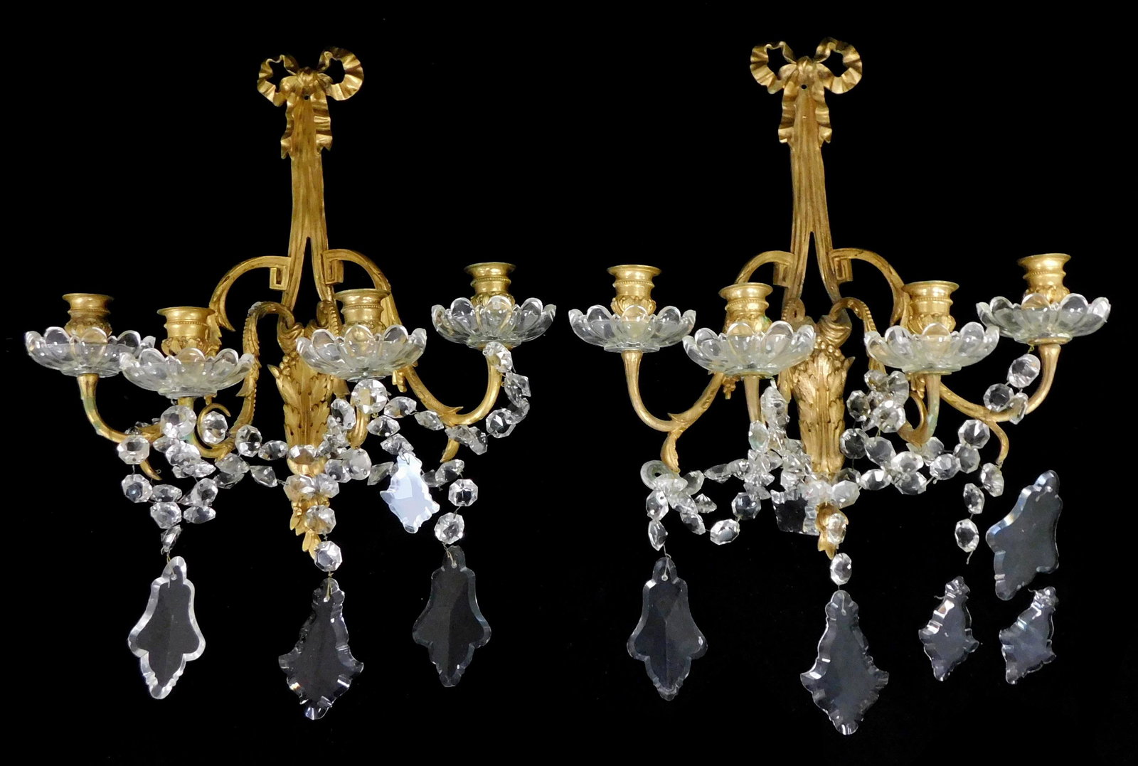 Pair of Continental gilt metal wall sconces, 19th C., ribbon swag and berry motif, with faceted (1 of 4)