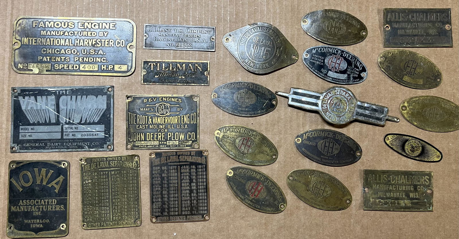 Collection of tractor and implement name plates, McCormick Deering, Case, Allis Chamlers, etc, good (1 of 3)