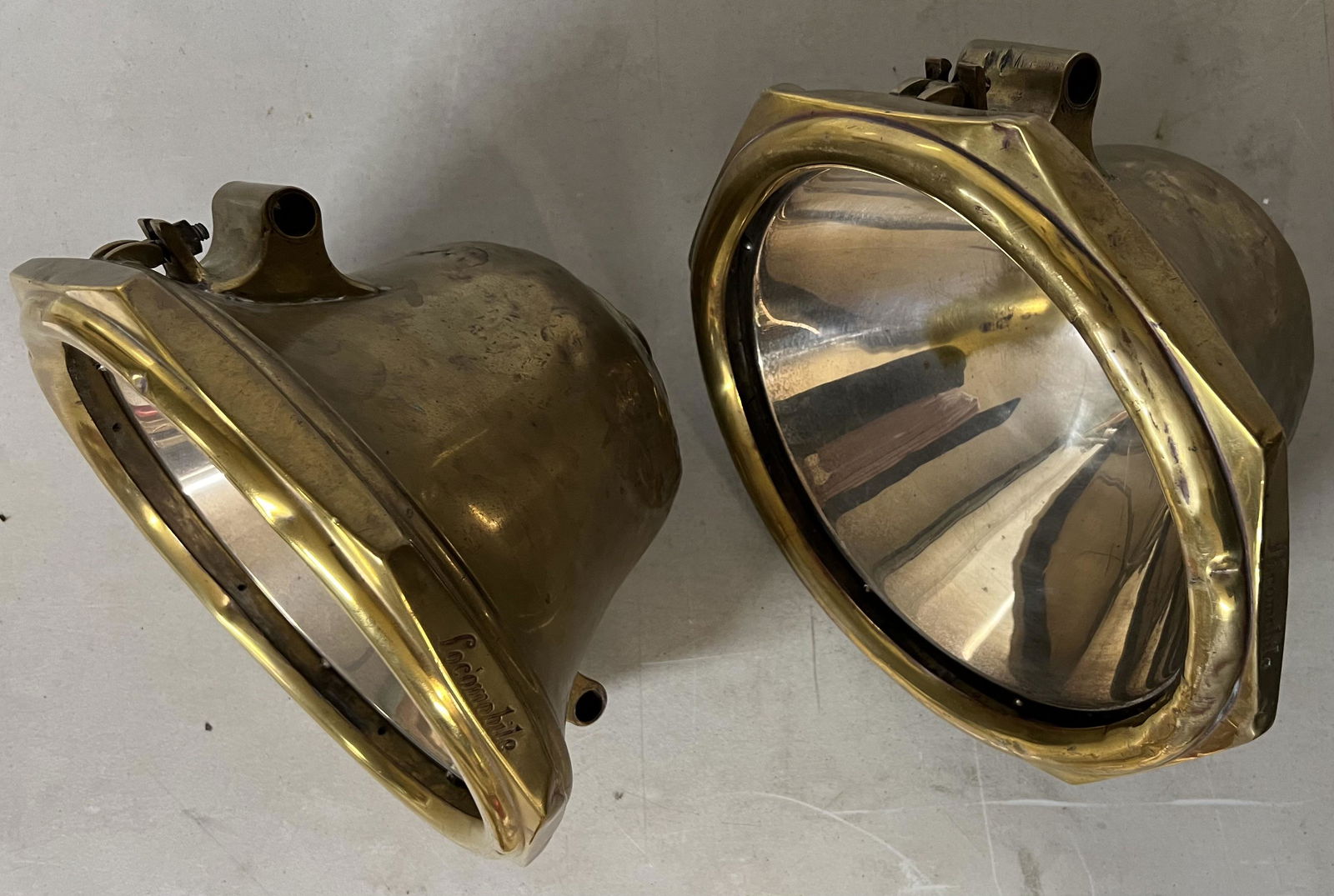 Pair of Locomobile brass electric head lights, 10.5 inch octagonal bezel, both missing glass, marked (1 of 4)