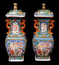 ASIAN: Pair of Chinese Export porcelain covered urns, late 18th C., Quing Dynasty, lids with foo dog