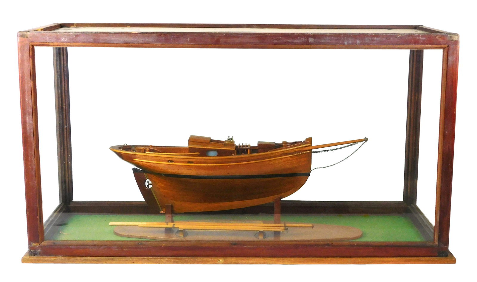 Ship model in glass case, 20th C., titled "Captain Walrus", comprised of wood and wood veneer, with: Ship model in glass case, 20th C., titled "Captain Walrus", comprised of wood and wood veneer, with metal accessories and detailing, ship rested on detachable custom stand, articulated rudder and till