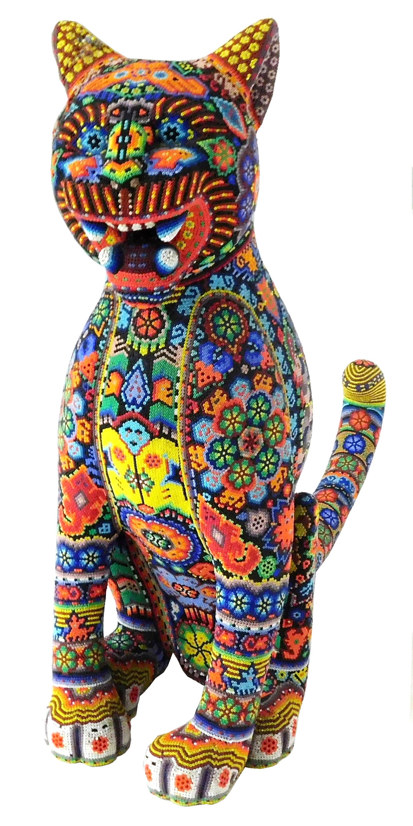 TRIBAL: Huichol beaded jaguar sculpture, Mexico, 20th C., chroma beads inlaid in wax onto carved: TRIBAL: Huichol beaded jaguar sculpture, Mexico, 20th C., chroma beads inlaid in wax onto carved wooden form, in two pieces, vibrant geometric pattern throughout, no signature viewed, wear consistent 