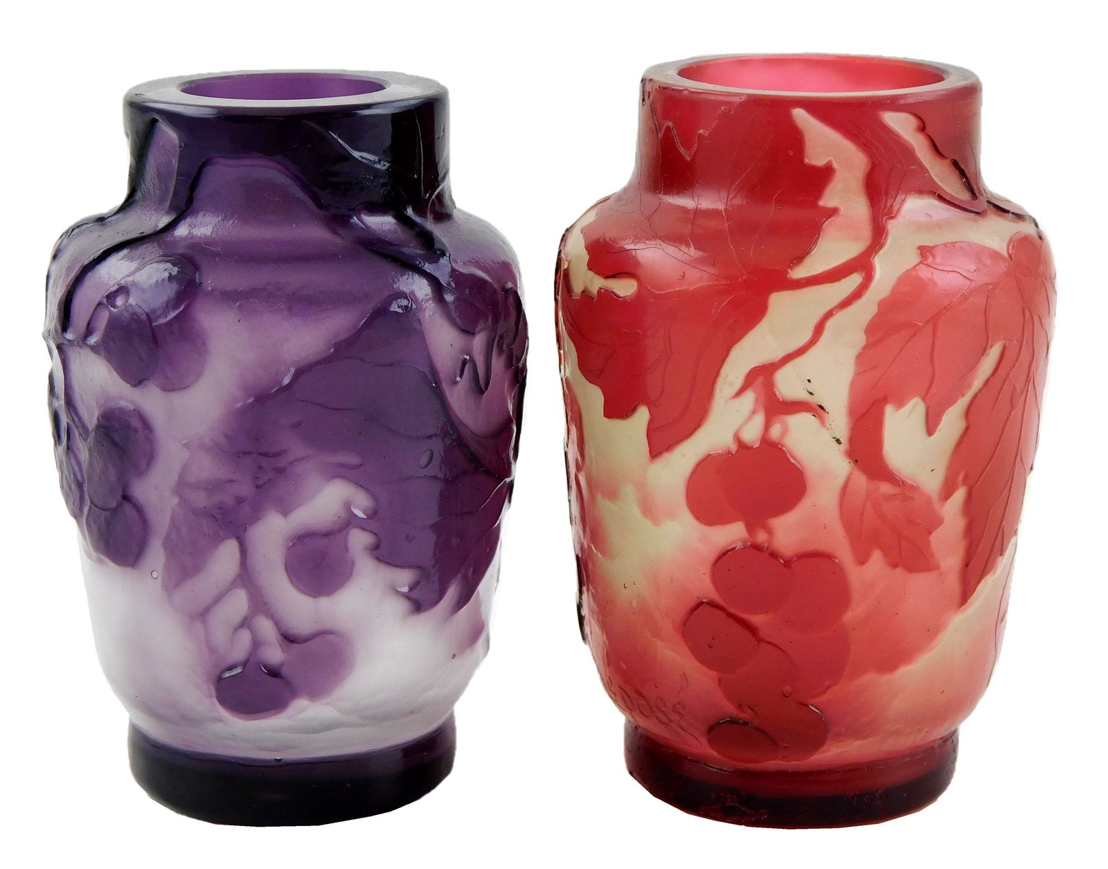 GLASS: Two small Galle cameo glass vases, one purple and one red, both have vine and leaf patterns, (1 of 4)