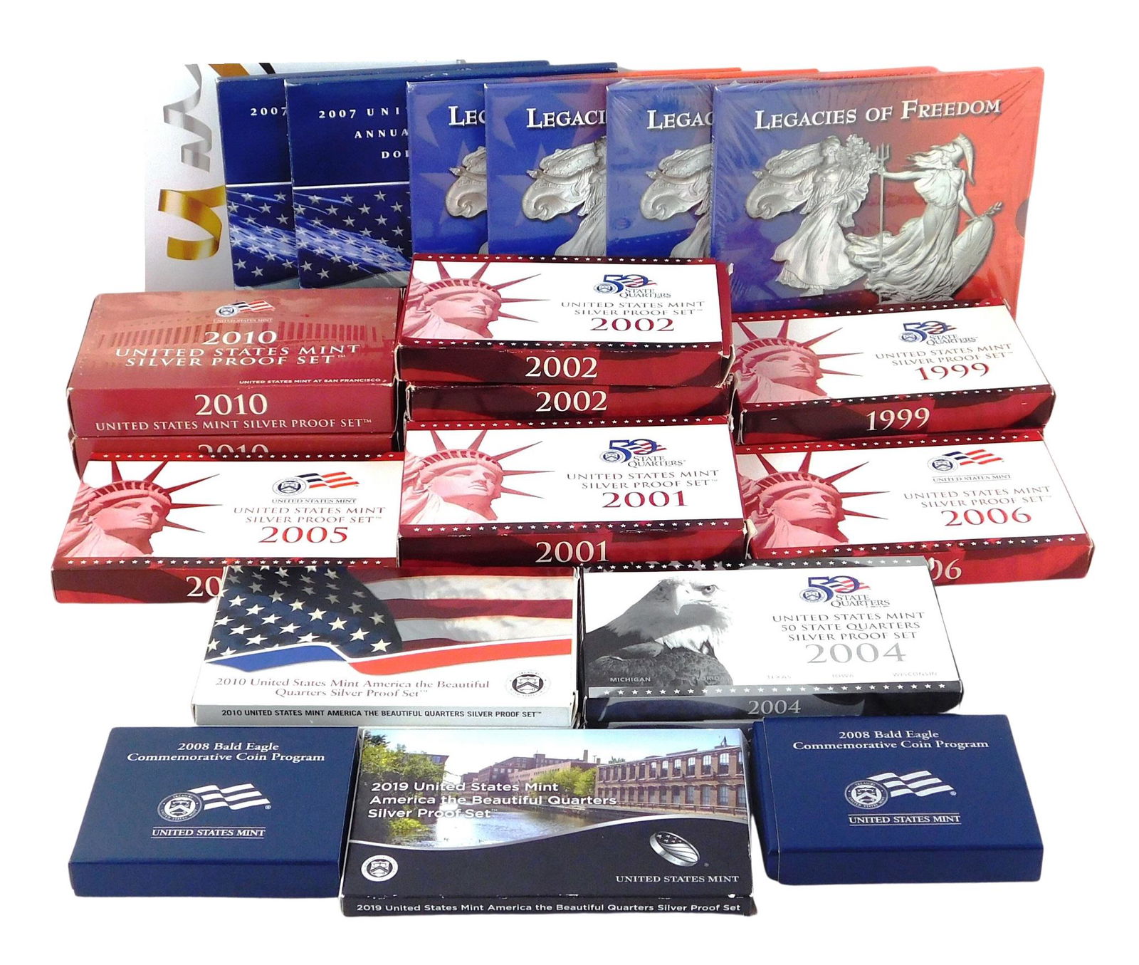 COINS: Twenty-six U.S. Mint coin sets including four 2003 Legacies of Freedom two-coin US/UK sets in (1 of 4)