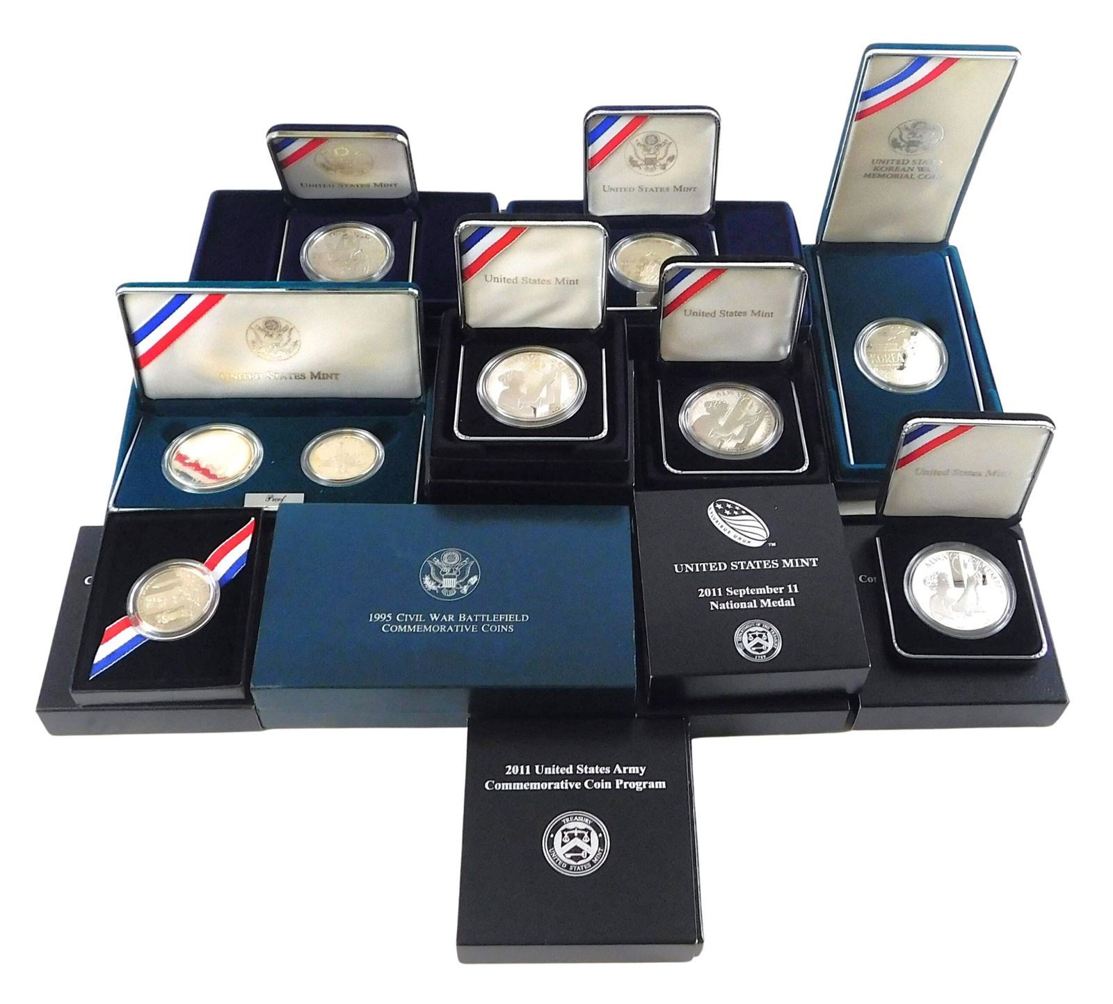 COINS: Eighteen U.S. Mint military themed commemorative coins, including two 1991 Korean War (1 of 4)