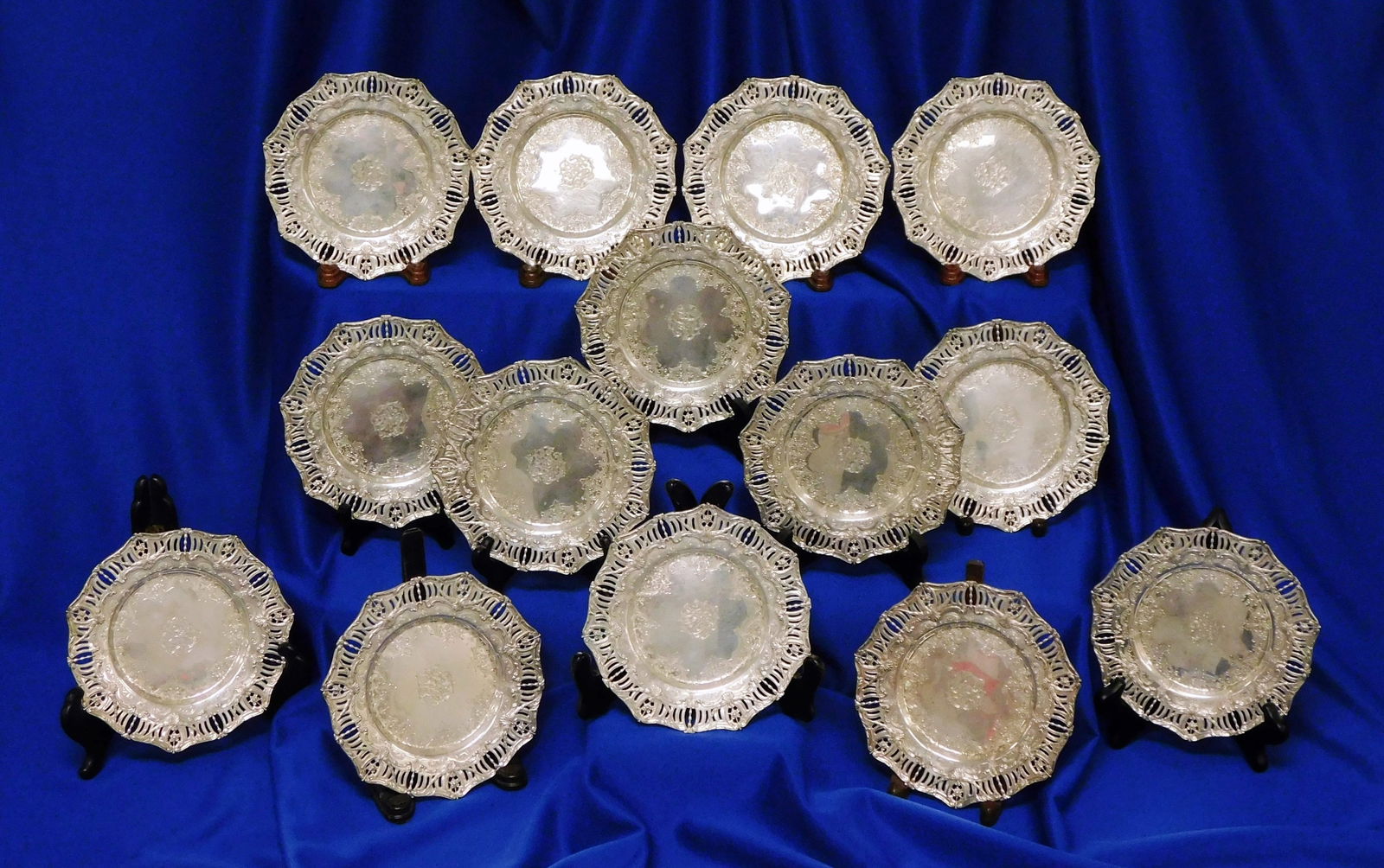 STERLING: Fourteen sterling silver bread plates by Graff Washbourne & Dunn, New York, N.Y., (1 of 9)