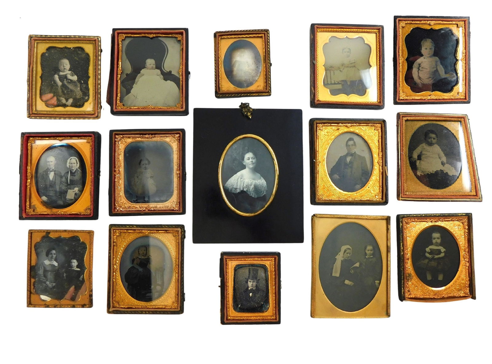 EARLY PHOTOGRAPHY: Fifteen early photographs of men, women, and children of different ages and (1 of 9)