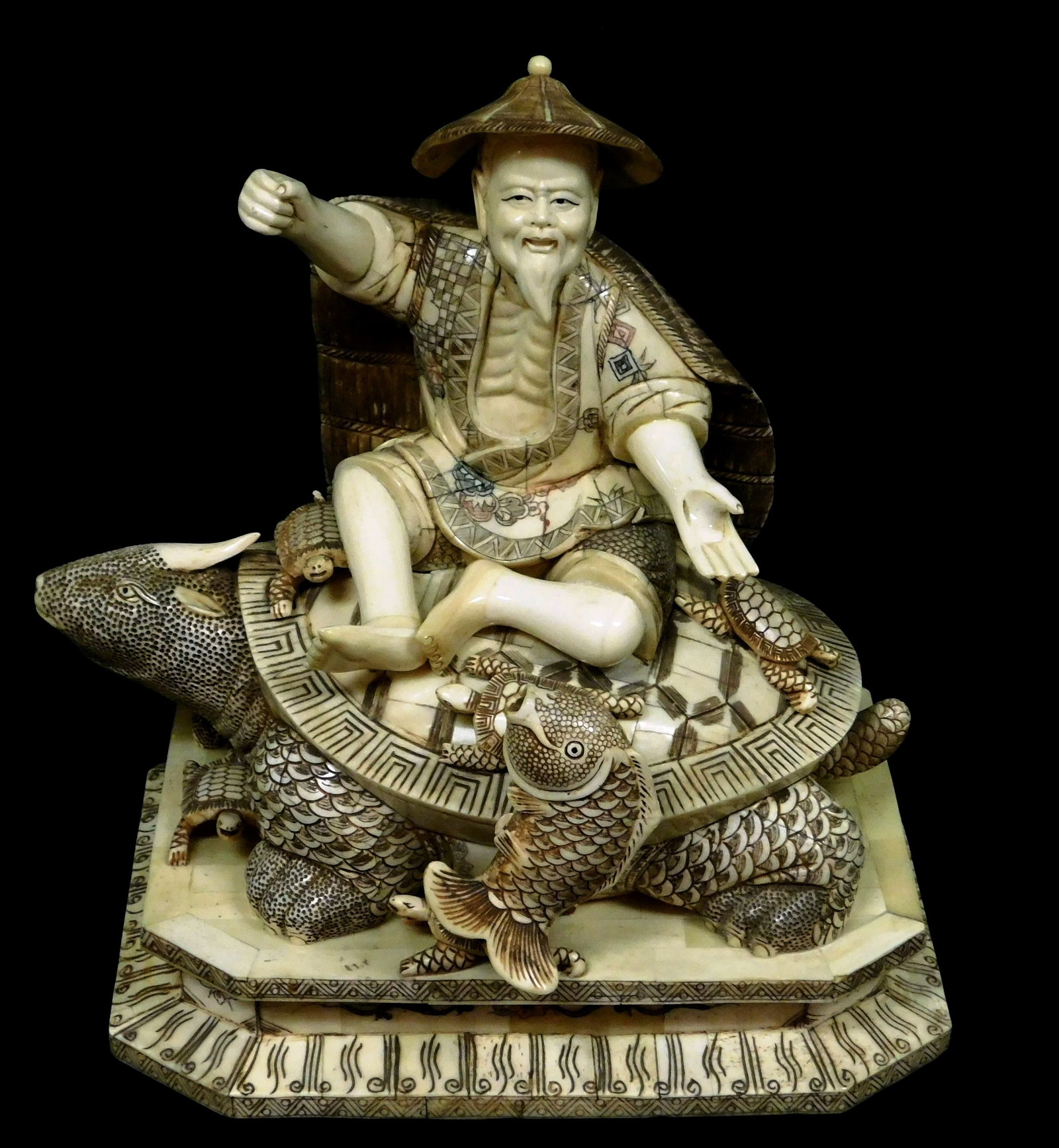 ASIAN: Large group sculpture of carved bone, Chinese, early to mid 20th C., depicts bearded older: ASIAN: Large group sculpture of carved bone, Chinese, early to mid 20th C., depicts bearded older fisherman, possibly Urashima Taro, originally holding pole and with line tied to fish in front, Taro i