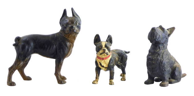 Hubley, etc.,Three dog cast door stops, early 20th C., including: two Hubley Boston Terriers; one: Hubley, etc.,Three dog cast door stops, early 20th C., including: two Hubley Boston Terriers; one schnauzer, not fully fastened; varying levels of wear consistent of age, use, and weathering, with