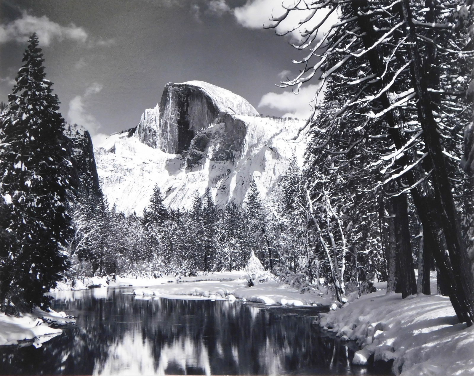 PHOTOGRAPHY: Ansel Adams (American, 1902-1984), "Half Dome, Merced River, Winter", silver gelatin (1 of 9)