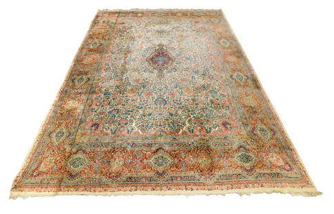 RUG: Semi-Antique Persian Kirman palace size carpet, 13' 6" x 19' 6", wool on cotton, floral design: RUG: Semi-Antique Persian Kirman palace size carpet, 13' 6" x 19' 6", wool on cotton, floral design in cream, pink, and blue, overall good condition, with wear consistent of age and use, including los