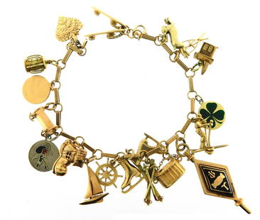 JEWELRY: Charm Bracelet, stamped 14K, yellow gold with elongated ribbed links and spring ring clasp,: JEWELRY: Charm Bracelet, stamped 14K, yellow gold with elongated ribbed links and spring ring clasp, 7" l., containing eighteen gold and one sterling charms: 14K yellow gold leaf charm, engraved, “1