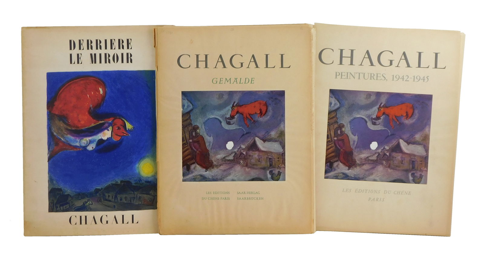 Three publications on Marc Changall's works, including: "Chagall Peintures 1942-1945 Print Portfolio (1 of 9)